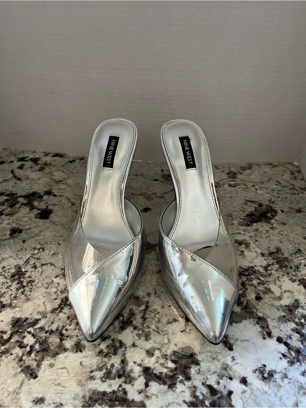 Nine West silver/clear pointed toe mules. Size 8.5 Pre-Owned Condition-Good
